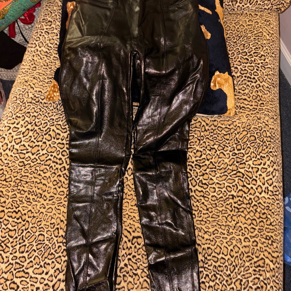 SPANX patent leather leggings.